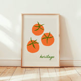 colourful stylish red tomato art print framed in warm sunny room